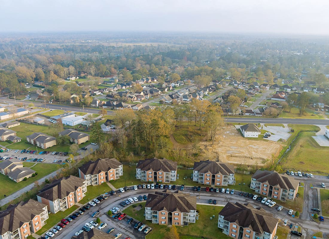 Gonzales, LA - Aerial Top View of Small Town in Denham Springs in Louisiana Good Weather Autumn Day
